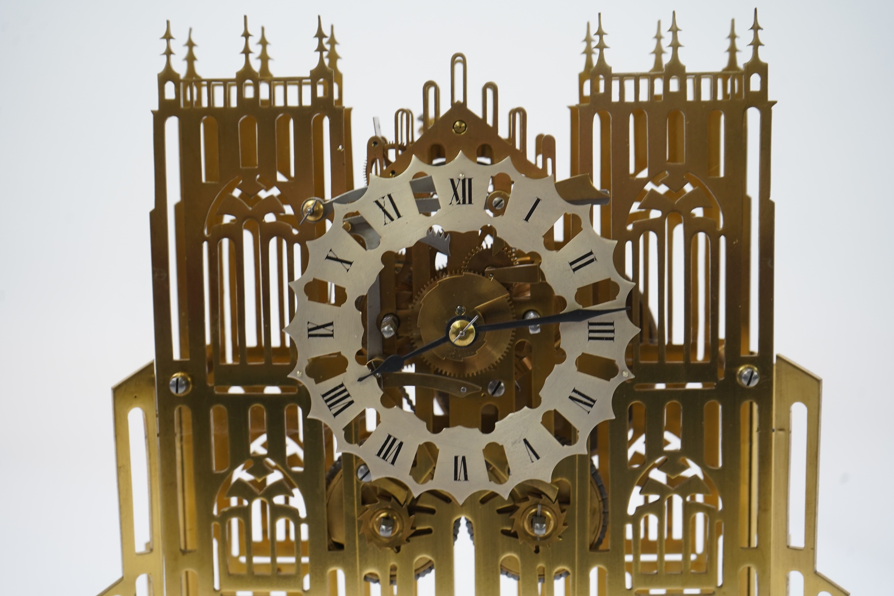 A mid 20th century brass skeleton ‘Cathedral’ clock